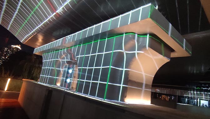 Projector calibration being executed on a large pillar at Jiangning Road Bridge.