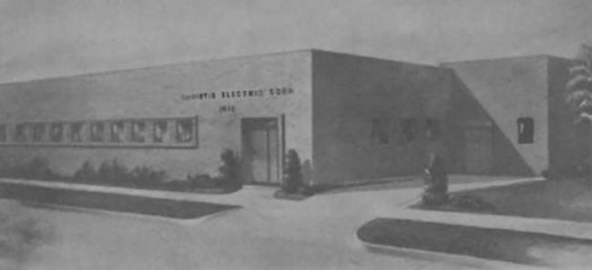 One-storey commercial building with windows and a front entrance.