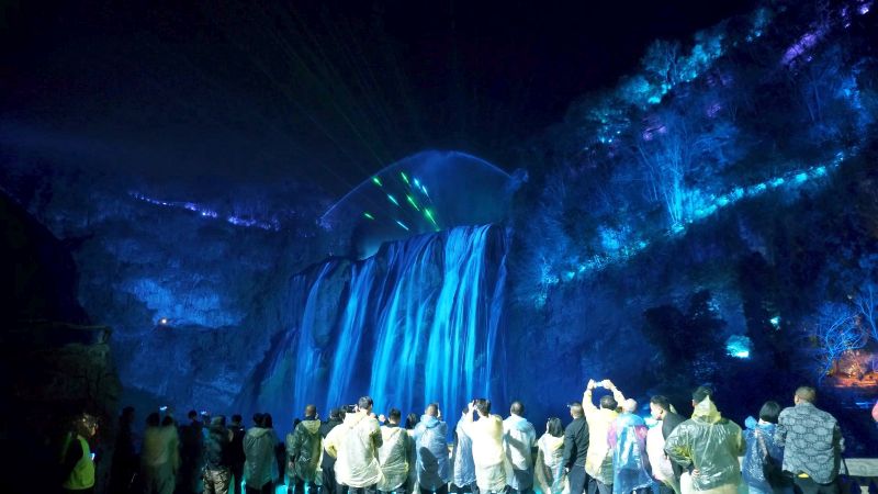 Spectators are mesmerized by the enchanting projections on the massive waterfall, which seemingly transport them into the world of &lsquo;Journey to the West&rsquo;.